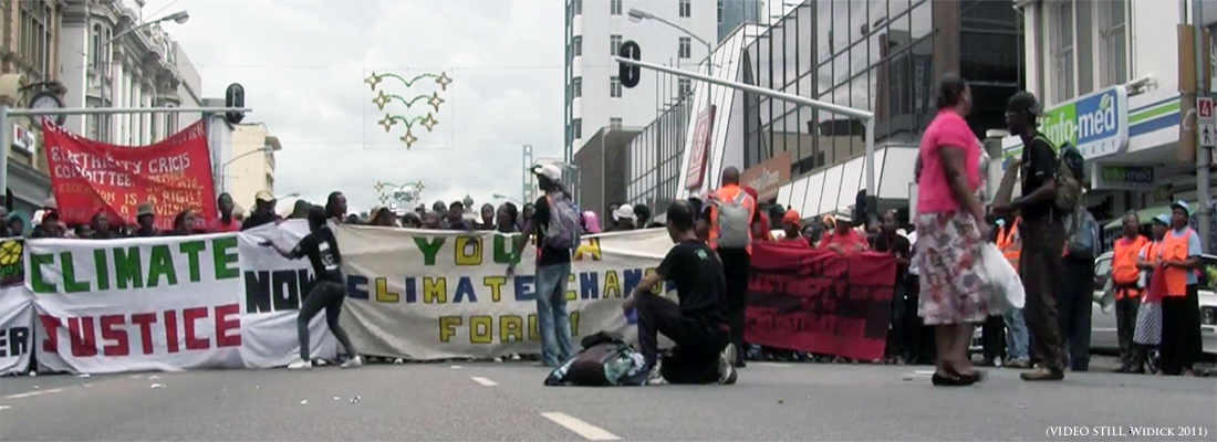 Protestors advance toward the camera at the People's Climate March, COP 17, Durban, South Africa, 2011